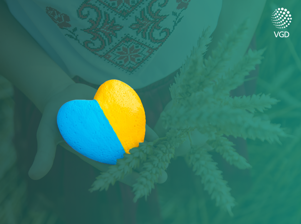 a heart in ukrainian colours on a childs hand