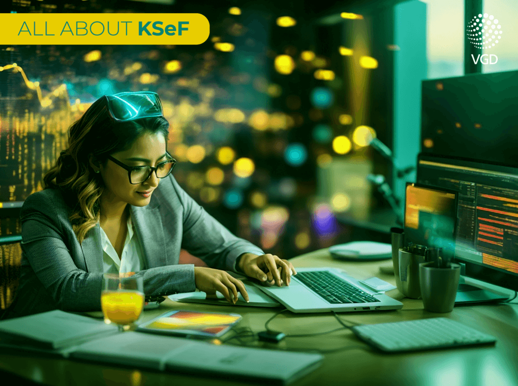 woman with glasses works on documents at the computer